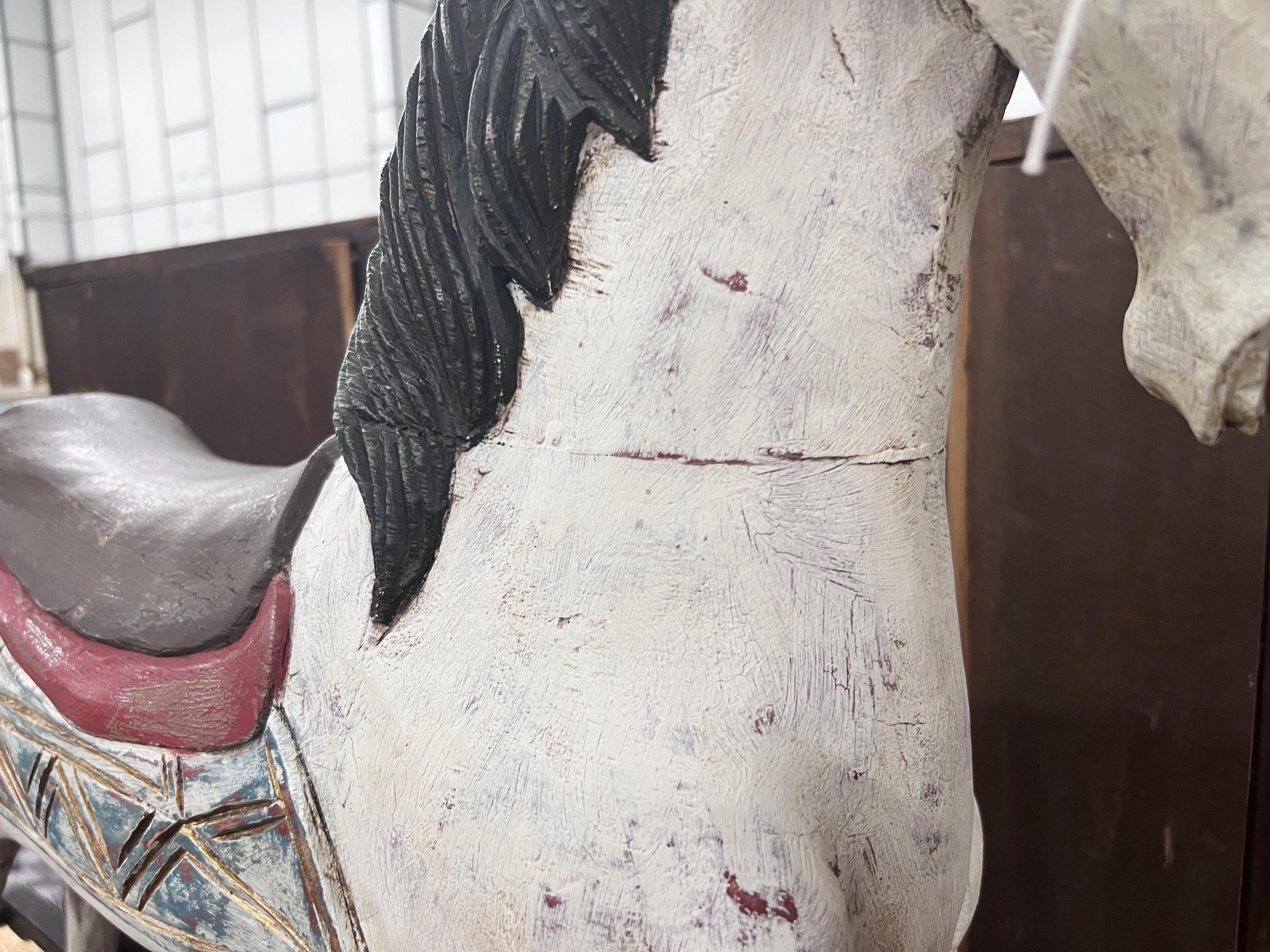 A Victorian style painted hardwood rocking horse, height 80cm